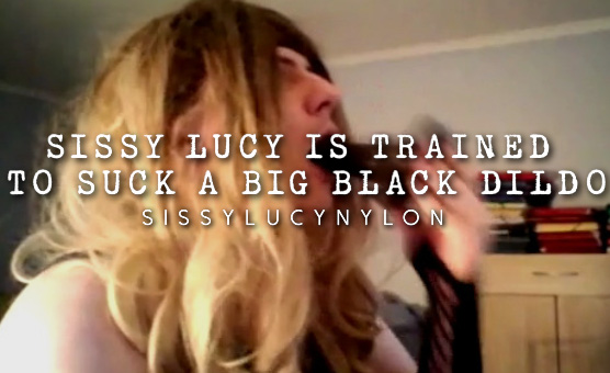 Sissy Lucy Is Trained To Suck A Big Black Dildo