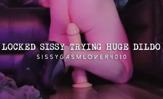 Locked Sissy Trying Huge Dildo